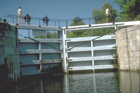 canalmen on lock gate